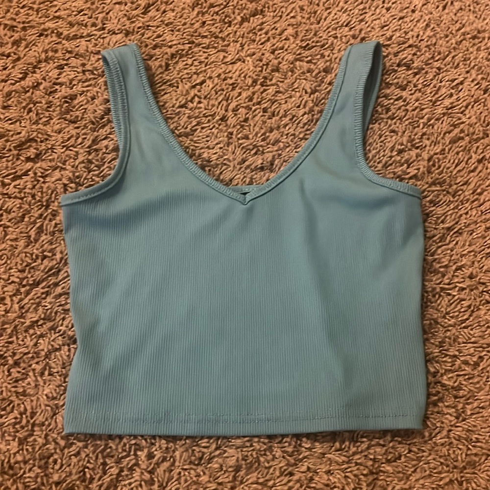 blue cropped shirt